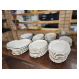 Assorted size oval plates and platters