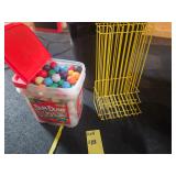Lot of blacklight and Regular Golf Balls and Rack
