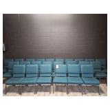 24 Green padded chairs