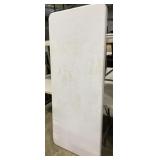 White Plastic Folding Table 29 x 71 inches.