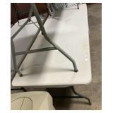 White Plastic Folding Table 30 x 71 Inches.