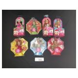 7 NOS Barbie Kelly Christmas/Holiday Dolls.
