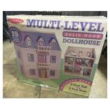 Melissa & Doug Multi-Level Wood Dollhouse.