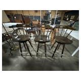 (3) Sturdy Oak Swiveling High Top Chairs.