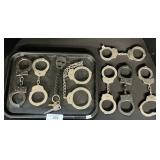 7 Handcuffs, Peerless & American Handcuff Co.