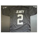 Autographed Ashton Jeanty Jersey.