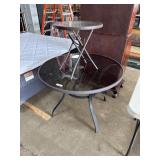 (2) Glass Top Patio Tables.