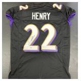 Autographed Derrick Henry Jersey.