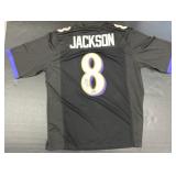 Autographed Lamar Jackson Jersey.