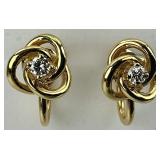14KT Gold Love Knot Diamond Earrings.