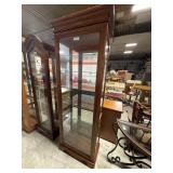 Lighted Oak Curio Cabinet.