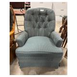 Mid Century Swiveling Rocker Armchair.