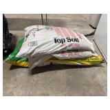 (3) Bags of Topsoil.