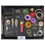 Santa Pez Dispenser, Brooches, Arrow Heads.