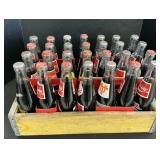 Vintage Coca Cola Bottles.: Bottles are full.