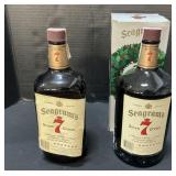 2 Seagramï¿½s Seven Crown Whiskey Bottles.