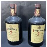 2 Seagramï¿½s Seven Crown Whiskey Bottles.