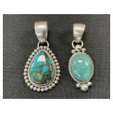 2 Navajo Sterling Silver & Turquoise Pendants.