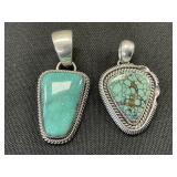 2 Navajo Sterling Silver & Turquoise Pendants.