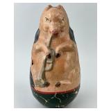 Papier Mache Musical Piggy Tumbler Toy.