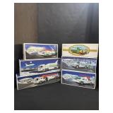 6 Hess Trucks.
