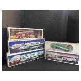 4 Hess Trucks, 1 Hess Truck Bank.