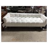 White Tufted Settee.