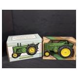 2 John Deere Collectors Tractors.