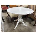 Round Wooden Pedestal Table.
