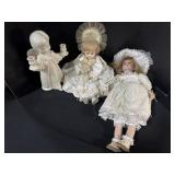 2 Porcelain Dolls & Iridescent Angel Candle