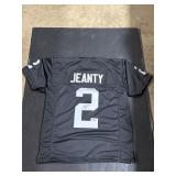 Autographed Ashton Jeanty Jersey.