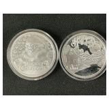 2 .999 Fine Silver Christmas Rounds.