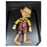 Vintage Wooden Jointed Pinocchio Doll.