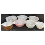 7 Pyrex Mixing Bowls.