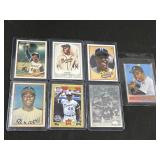 7 Hank Aaron Baseball Cards.
