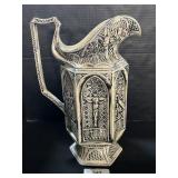 Vintage Molded Ceramic Religious Scene Pitcher.