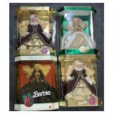4 NOS Holiday Barbies.