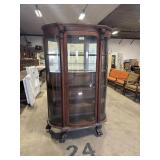 Ornate Carved Oak Bow Front Curio Cabinet.