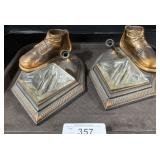 Copper Baby Shoe Ashtrays.