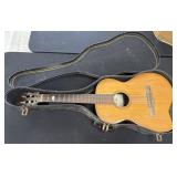 Omega Acoustic Guitar.