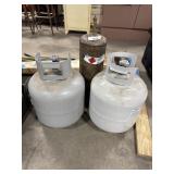 Acetylene Bottle, (2) Propane Bottles.