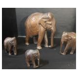 4 Wooden Elephant Statues.