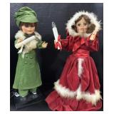2 Christmas Caroler Light Up Dolls.
