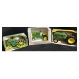 Three Model John Deere Tractors.