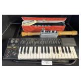 Yamaha Synthesizer, Wooden Recorder.