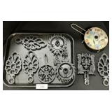 Cast Iron & Mosaic Trivets.