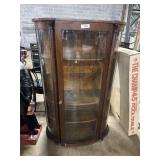 Ornate Oak Bow Front Curio Cabinet.
