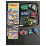 Vintage Transformers Action Figures & Books.