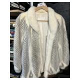 Muscalus Furs Coat.