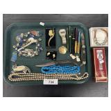 Costume Jewelry, Pocket Knives, Pens.